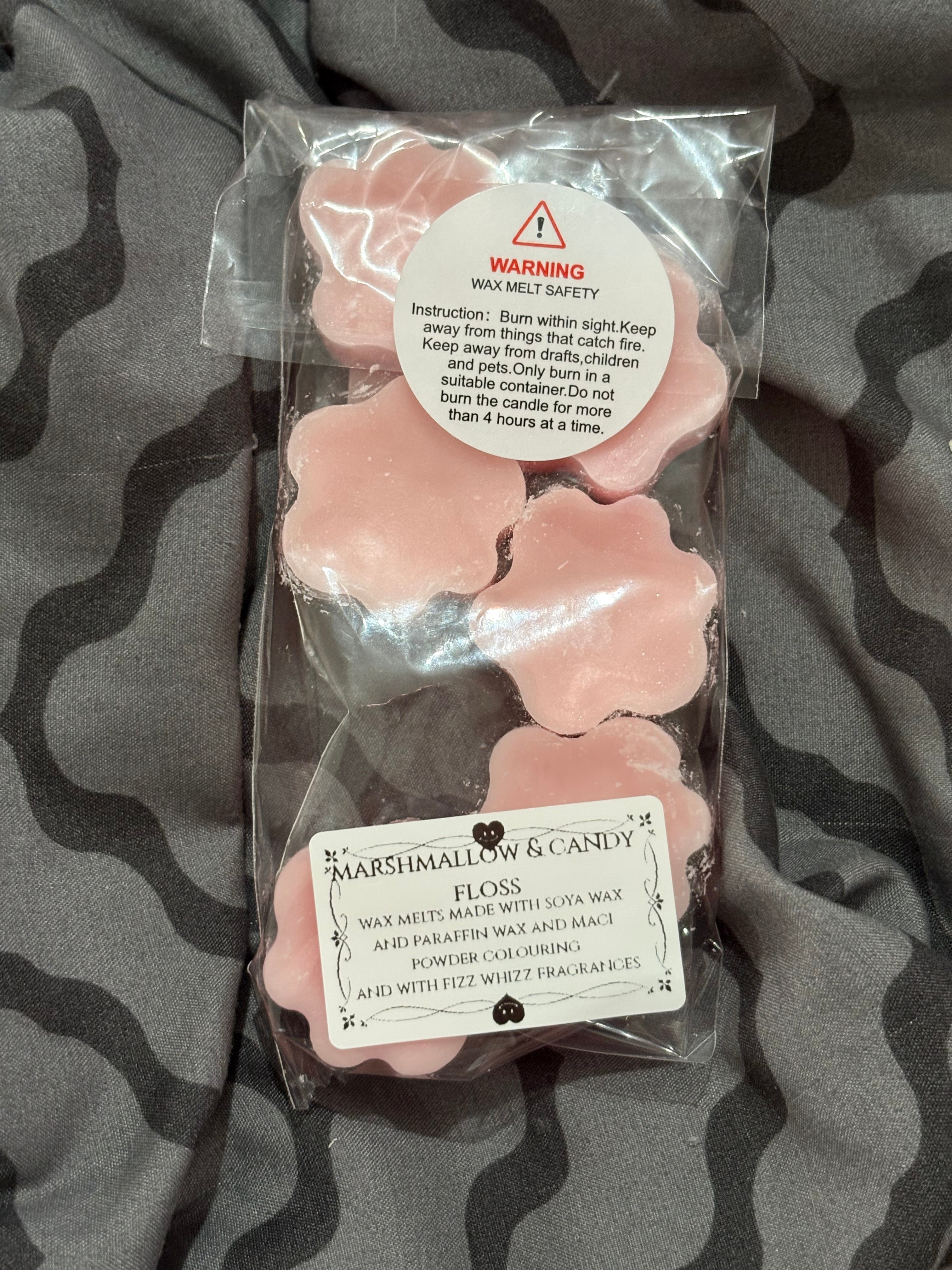 Small Paw prints in the fragrance of marshmallows & candyfloss